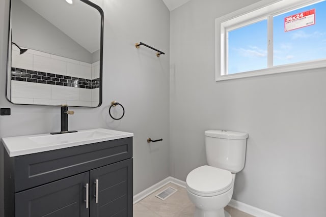 15355 7th Ave, Phoenix, IL 60426 - bathroom with vanity, vaulted ceiling, and tile patterned flooring