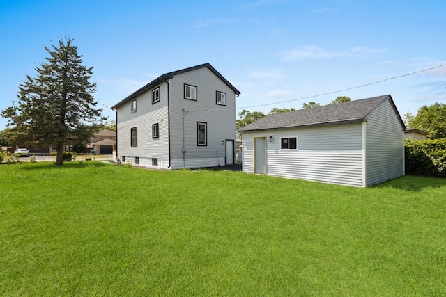 15355 7th Ave, Phoenix, IL 60426 - back of house with a yard and an outbuilding