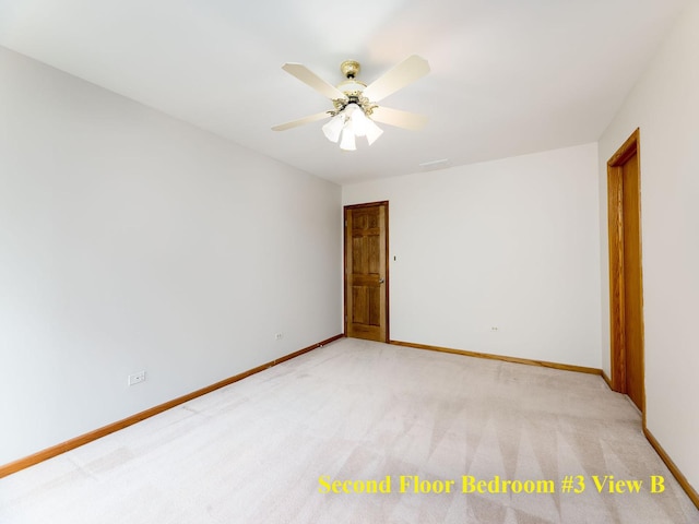 6527 N Onarga Ave, Chicago, IL 60631 - unfurnished room with light carpet and a ceiling fan
