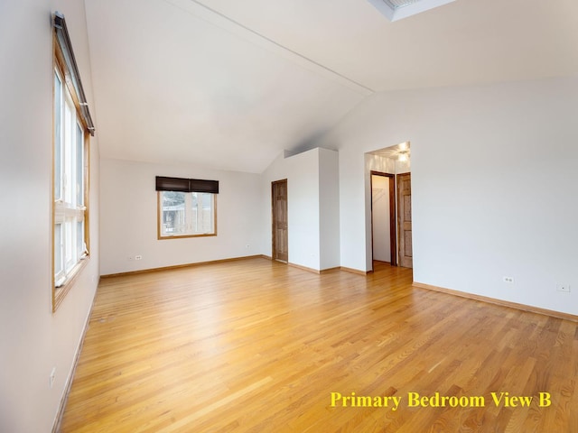 6527 N Onarga Ave, Chicago, IL 60631 - unfurnished room featuring vaulted ceiling and light wood finished floors