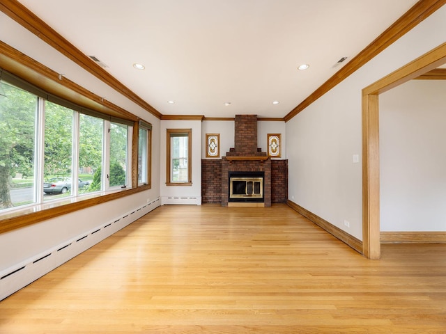 6527 N Onarga Ave, Chicago, IL 60631 - unfurnished living room with a baseboard heating unit, ornamental molding, light wood-style floors, a brick fireplace, and recessed lighting