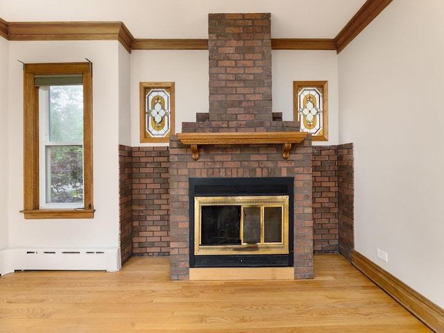 6527 N Onarga Ave, Chicago, IL 60631 - detailed view of a baseboard heating unit, ornamental molding, wood finished floors, and a brick fireplace