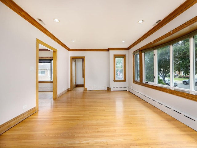 6527 N Onarga Ave, Chicago, IL 60631 - empty room featuring a baseboard radiator, baseboard heating, ornamental molding, light wood-style flooring, and recessed lighting