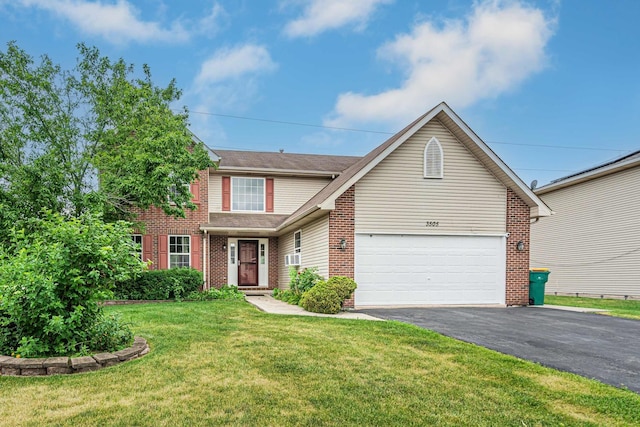 3505 Indian Head Ln, Joliet, IL 60435 - traditional home with asphalt driveway, a front lawn, an attached garage, and brick siding