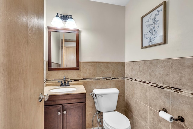 3505 Indian Head Ln, Joliet, IL 60435 - bathroom featuring vanity, tile walls, and wainscoting
