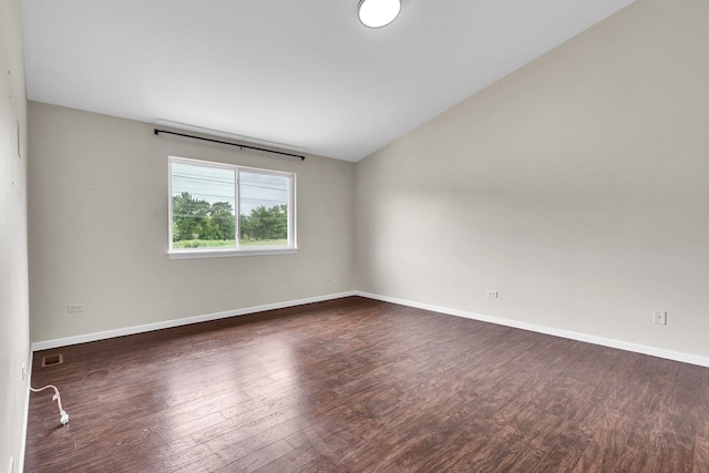 3505 Indian Head Ln, Joliet, IL 60435 - spare room featuring dark wood finished floors and lofted ceiling