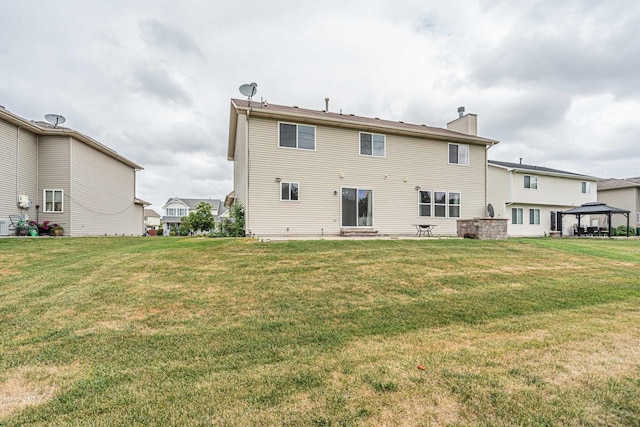3505 Indian Head Ln, Joliet, IL 60435 - back of property with a gazebo, a chimney, and a lawn
