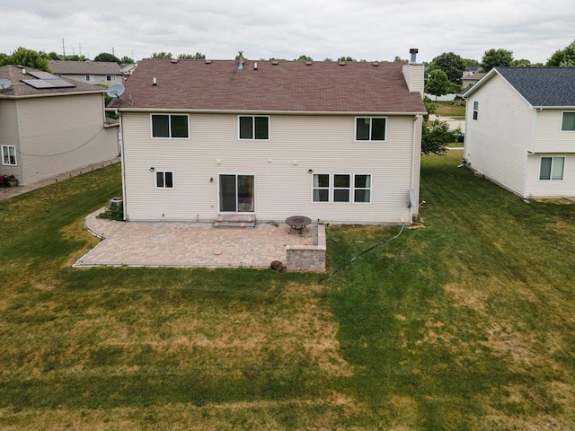 3505 Indian Head Ln, Joliet, IL 60435 - rear view of house with a patio and a yard