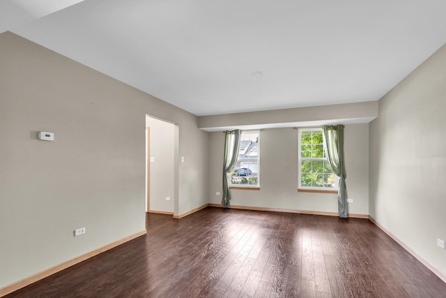 3505 Indian Head Ln, Joliet, IL 60435 - spare room featuring dark wood-type flooring and baseboards
