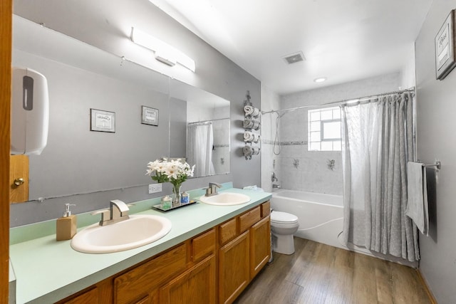 14801 S Harrison Ave, Posen, IL 60469 - full bath with shower / bath combo, double vanity, and wood finished floors