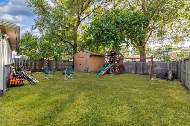 14801 S Harrison Ave, Posen, IL 60469 - fenced backyard featuring a playground and a storage unit