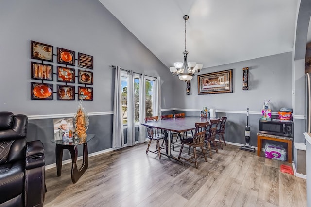 14801 S Harrison Ave, Posen, IL 60469 - dining room with a chandelier, wood finished floors, and high vaulted ceiling
