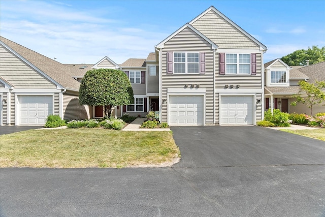2204 Waterleaf Ct Unit 103, Naperville, IL 60564 - traditional-style home featuring driveway, a garage, and a front lawn