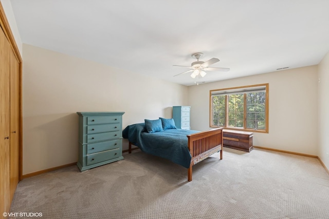 10809 Chaucer Dr, Willow Springs, IL 60480 - bedroom featuring light carpet, a closet, and ceiling fan