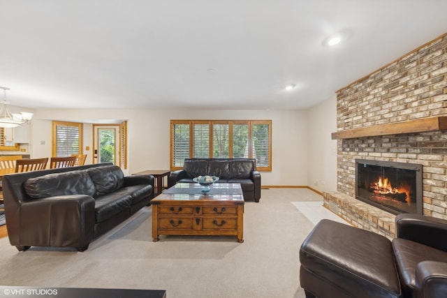10809 Chaucer Dr, Willow Springs, IL 60480 - living area with a brick fireplace, light carpet, recessed lighting, and a chandelier