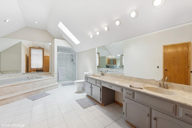 10809 Chaucer Dr, Willow Springs, IL 60480 - bathroom with double vanity, a shower stall, vaulted ceiling, a bath, and a skylight