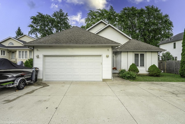 20739 N Weiland Rd, Prairie View, IL 60069 - view of front facade with concrete driveway, roof with shingles, and a garage