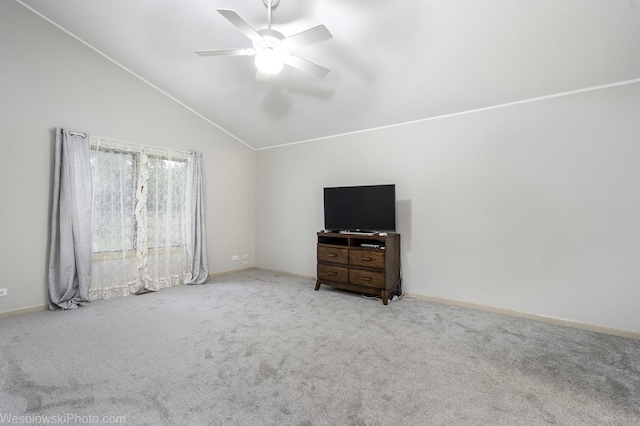 20739 N Weiland Rd, Prairie View, IL 60069 - unfurnished living room with vaulted ceiling, a ceiling fan, and carpet flooring