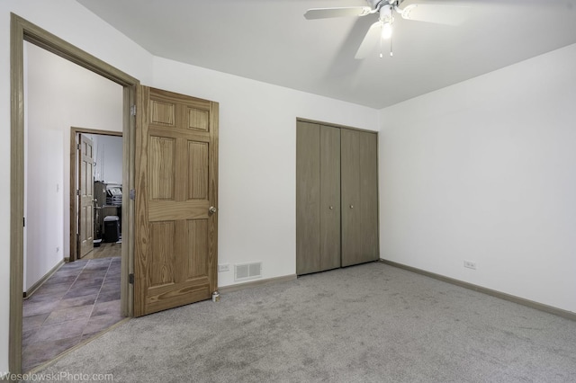 20739 N Weiland Rd, Prairie View, IL 60069 - unfurnished bedroom with carpet flooring, a closet, and a ceiling fan