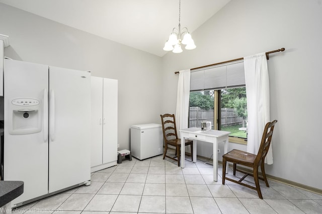 20739 N Weiland Rd, Prairie View, IL 60069 - dining space with a chandelier, light tile patterned floors, and high vaulted ceiling