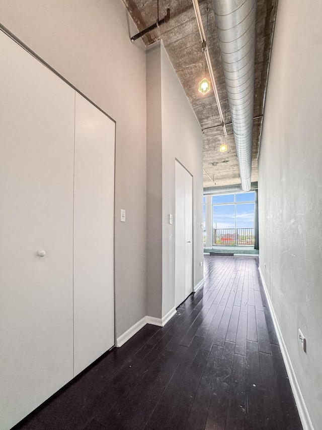 1550 S Blue Island Ave Unit 1125, Chicago, IL 60608 - corridor with dark wood-style floors and baseboards
