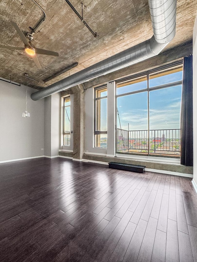 1550 S Blue Island Ave Unit 1125, Chicago, IL 60608 - unfurnished living room with wood finished floors and a ceiling fan
