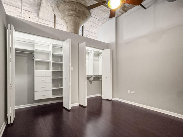 1550 S Blue Island Ave Unit 1125, Chicago, IL 60608 - unfurnished bedroom featuring hardwood / wood-style flooring, multiple closets, and a ceiling fan