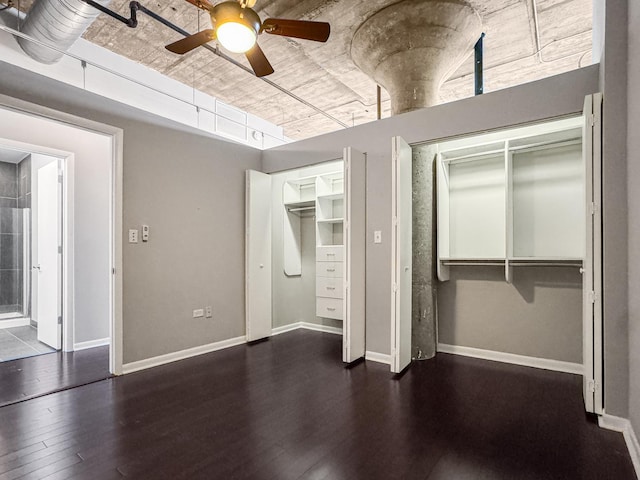 1550 S Blue Island Ave Unit 1125, Chicago, IL 60608 - unfurnished bedroom featuring multiple closets, wood finished floors, and a ceiling fan