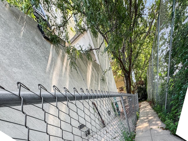 1550 S Blue Island Ave Unit 1125, Chicago, IL 60608 - view of home's exterior featuring stucco siding