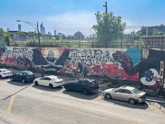 1550 S Blue Island Ave Unit 1125, Chicago, IL 60608 - uncovered parking lot featuring a view of city