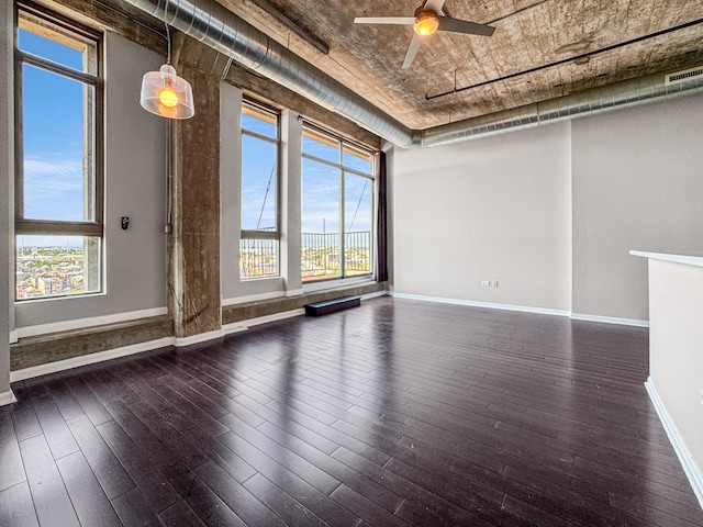 1550 S Blue Island Ave Unit 1125, Chicago, IL 60608 - unfurnished room with ceiling fan and dark wood-style floors