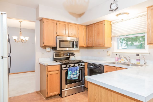 216 Dickens Trl, Elgin, IL 60120 - kitchen with appliances with stainless steel finishes, light countertops, light brown cabinetry, and light wood-type flooring