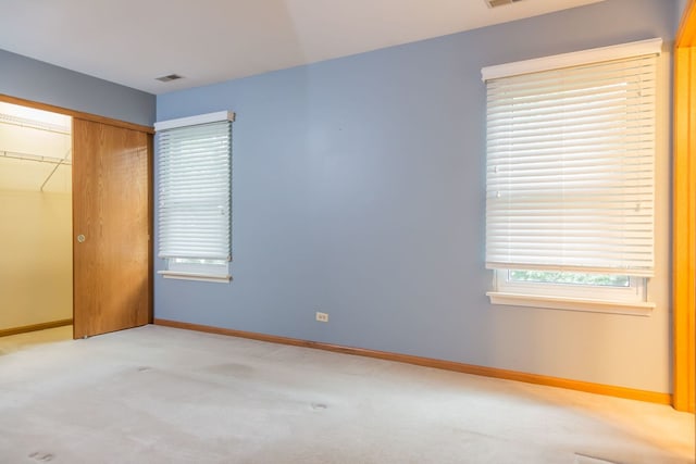 216 Dickens Trl, Elgin, IL 60120 - unfurnished bedroom with a closet and carpet flooring