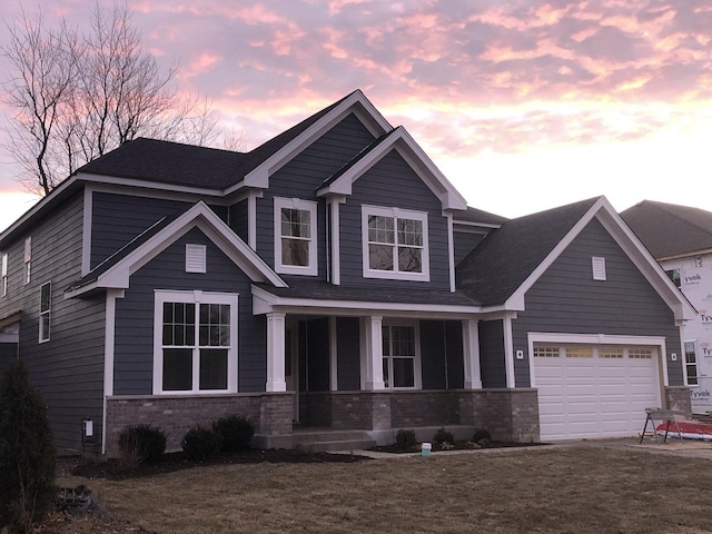 1122 W Wilson St, Palatine, IL 60067 - craftsman inspired home featuring a porch, brick siding, and a front lawn