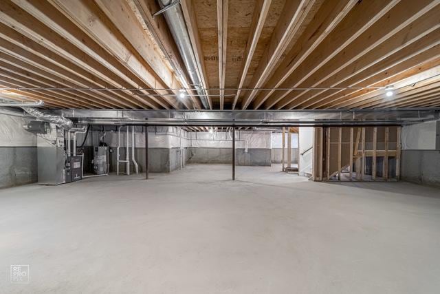 1122 W Wilson St, Palatine, IL 60067 - unfinished basement with heating unit and gas water heater