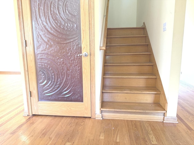 1136 Park Pl, Bellwood, IL 60104 - stairway with wood finished floors