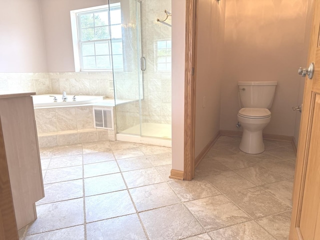 1136 Park Pl, Bellwood, IL 60104 - full bathroom featuring a garden tub, a stall shower, and tile patterned flooring