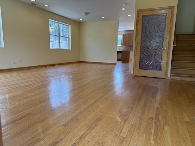 1136 Park Pl, Bellwood, IL 60104 - unfurnished room with light wood-style flooring, recessed lighting, and stairs