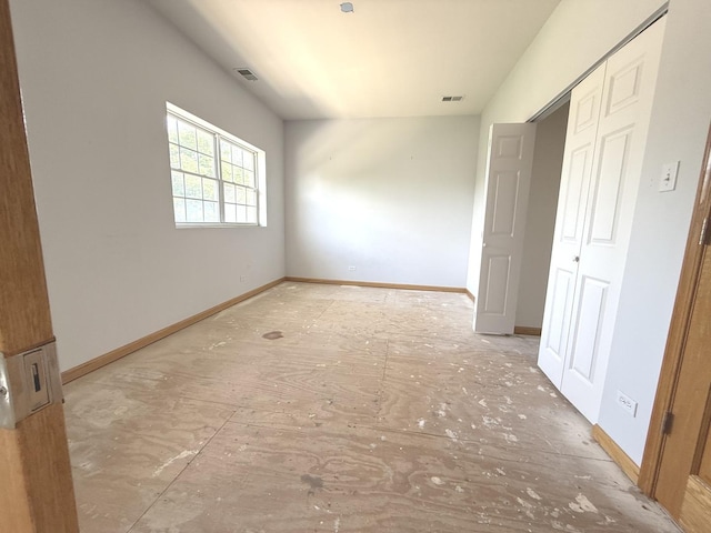 1136 Park Pl, Bellwood, IL 60104 - unfurnished bedroom featuring a closet and baseboards