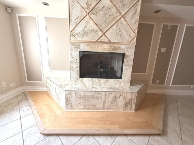 1136 Park Pl, Bellwood, IL 60104 - detailed view of baseboards and a high end fireplace