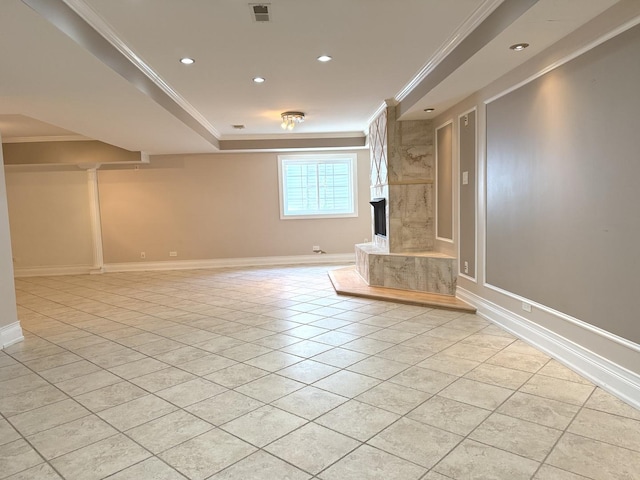 1136 Park Pl, Bellwood, IL 60104 - unfurnished living room with crown molding, light tile patterned floors, a fireplace, and recessed lighting