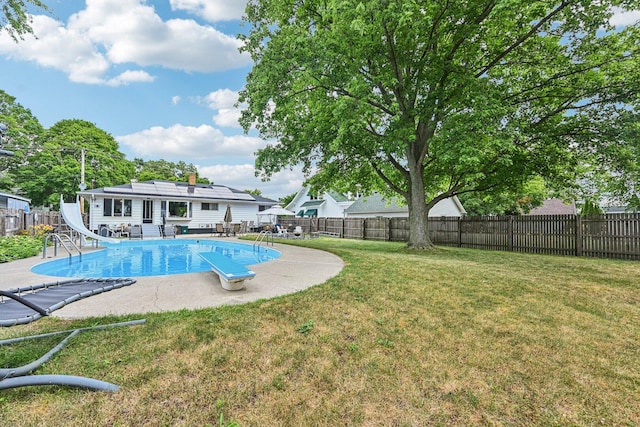 412 E S St, Peotone, IL 60468 - view of pool with a water slide, a fenced backyard, and a patio