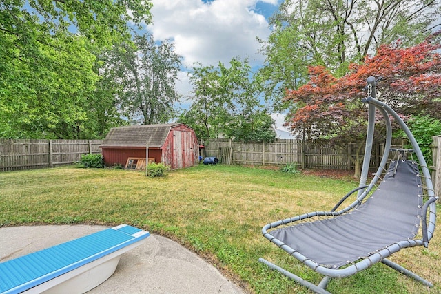 412 E S St, Peotone, IL 60468 - fenced backyard featuring a shed