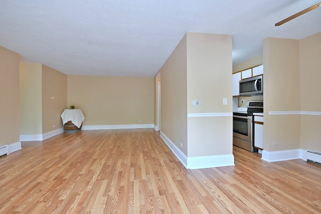 1813 Hemlock Pl Unit 306, Schaumburg, IL 60173 - empty room featuring a ceiling fan and light wood-style floors