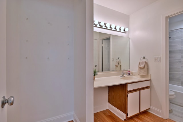 1813 Hemlock Pl Unit 306, Schaumburg, IL 60173 - bathroom with vanity, washtub / shower combination, and wood finished floors
