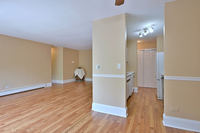 1813 Hemlock Pl Unit 306, Schaumburg, IL 60173 - unfurnished room with light wood-style flooring and a baseboard heating unit