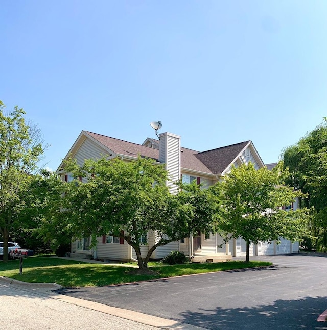 601 Fox Ridge Dr Unit 601, Fox Lake, IL 60020 - view of property featuring a garage