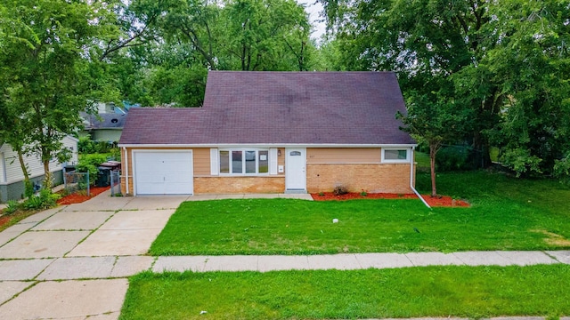 437 Winnebago St, Park Forest, IL 60466 - view of front of property featuring brick siding, an attached garage, driveway, and a front lawn