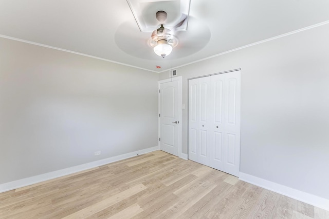 437 Winnebago St, Park Forest, IL 60466 - unfurnished bedroom with ornamental molding, wood finished floors, a closet, and a ceiling fan