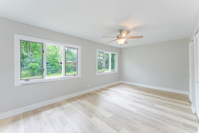 437 Winnebago St, Park Forest, IL 60466 - unfurnished room featuring ceiling fan and light wood-style floors